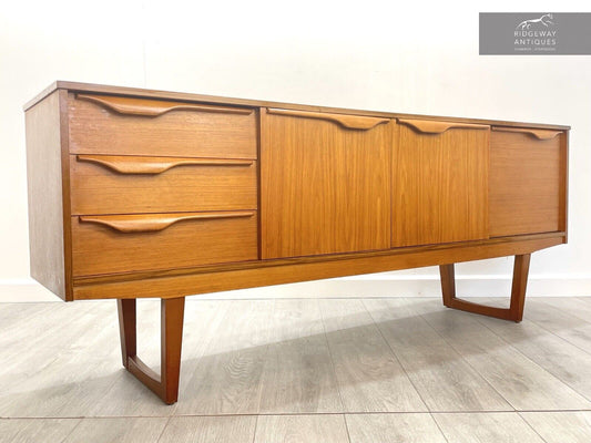 A Mid Century, Vintage Veneered Sideboard  in The Dunvegan Style