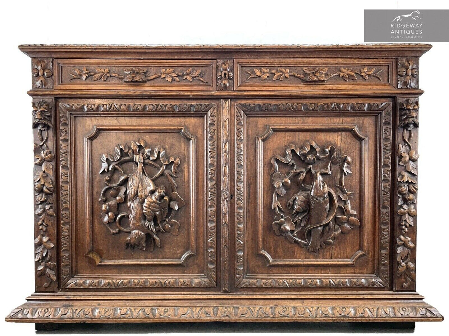 19th Century - Green Man Oak Carved Sideboard with Carvings of Game
