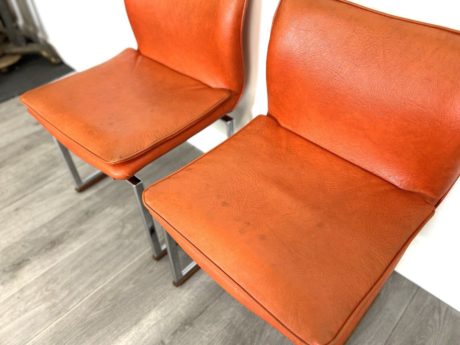 Pieff Epee, Pair of Chrome and Orange Leather Dining Chairs