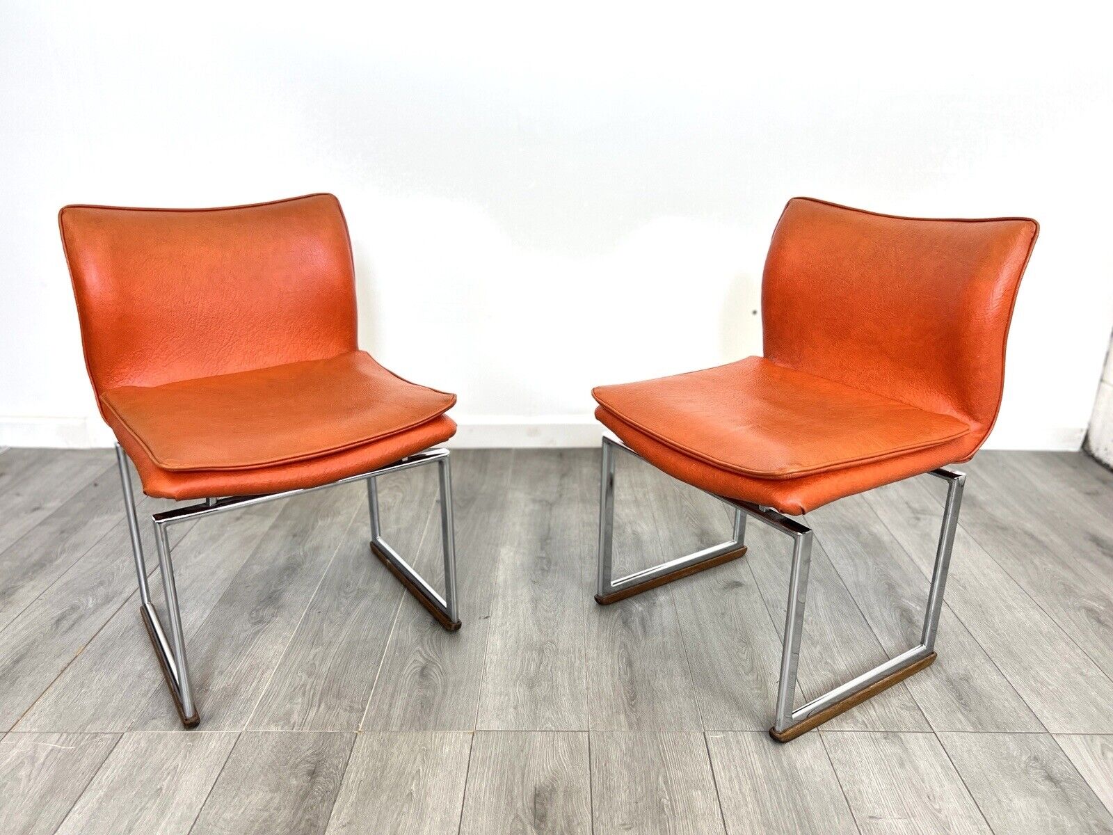 Pieff Epee, Pair of Chrome and Orange Leather Dining Chairs