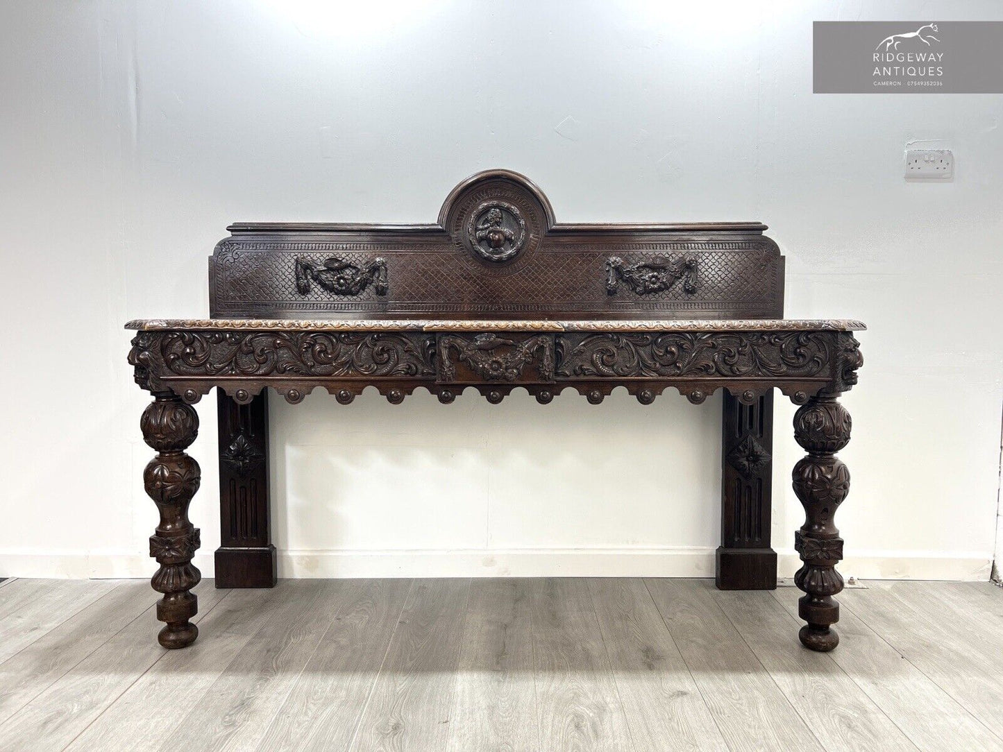 A Large Elizabethan Revival, Lion Mask Carved Console / Serving Table