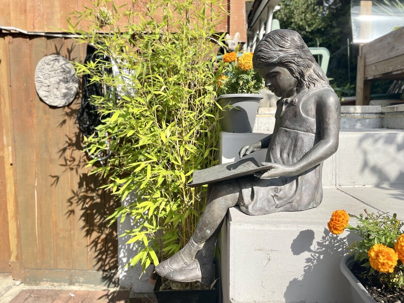 Bronzed Garden Statue of a Young Girl, Sitting Reading a Book