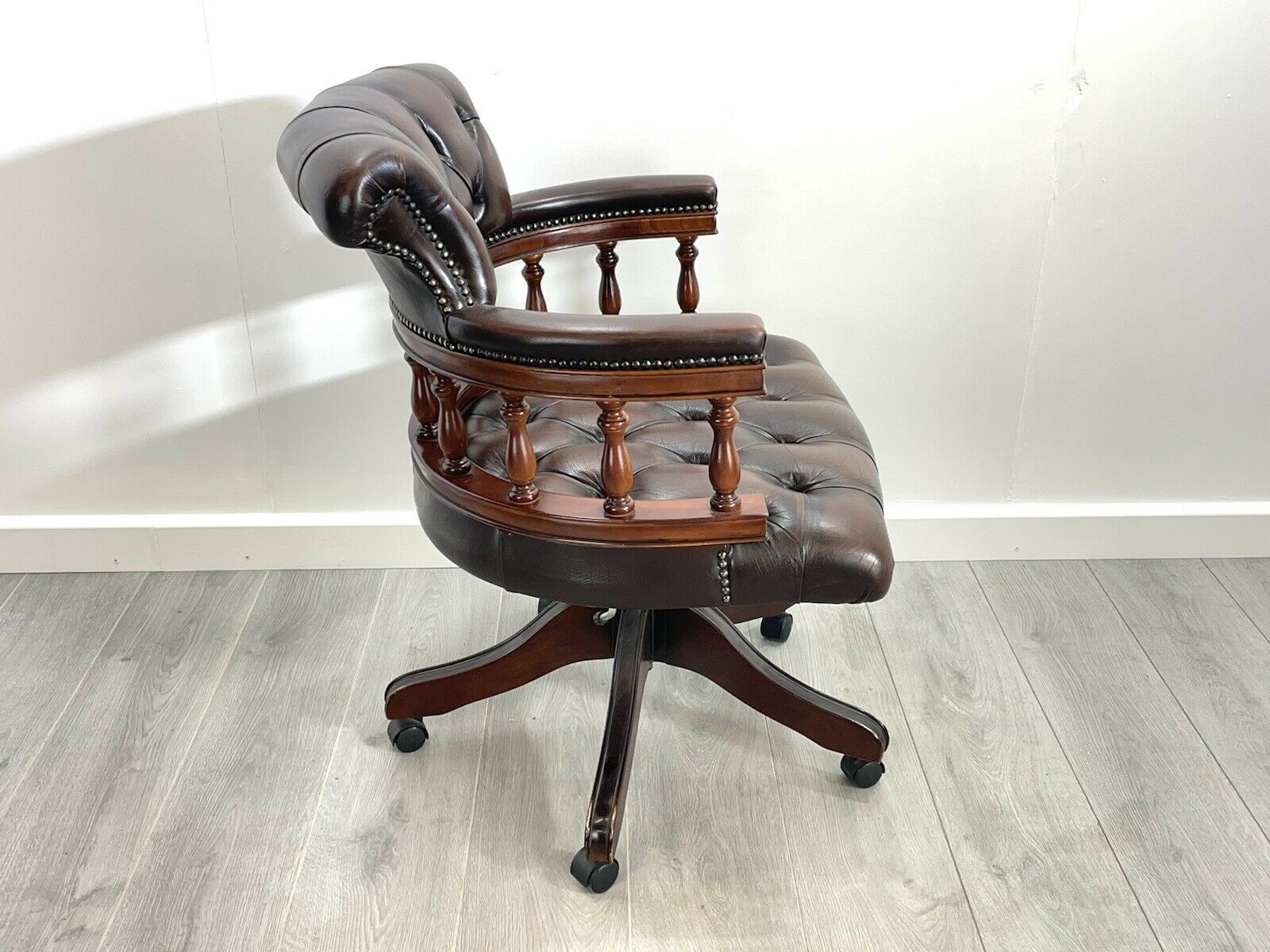 Brown Leather and Mahogany, Swivel Captains Chair