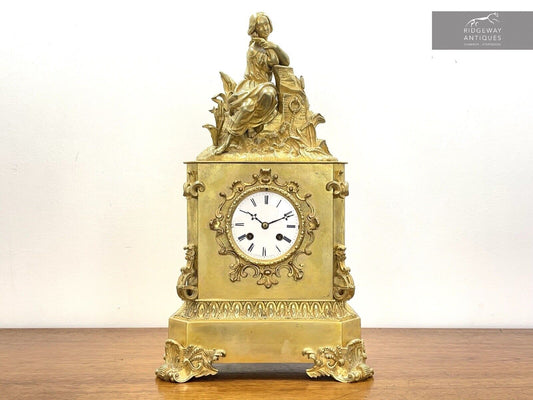 A fine, 19th Century French Empire, Gilt Mantel Clock by Raingo Freres