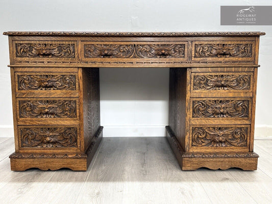 19th Century, Carved Oak, Flemish Style / Green Man Double Pedestal Desk