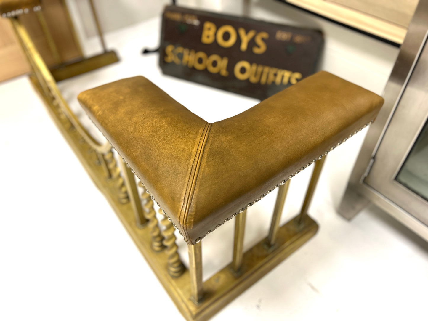 Brass Club Fender with Camel Leather Upholstered Seat