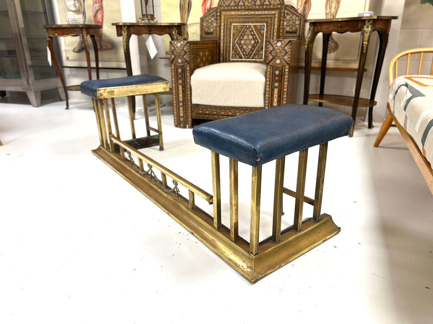 Brass Club Fender with Blue Leather Upholstered Seat