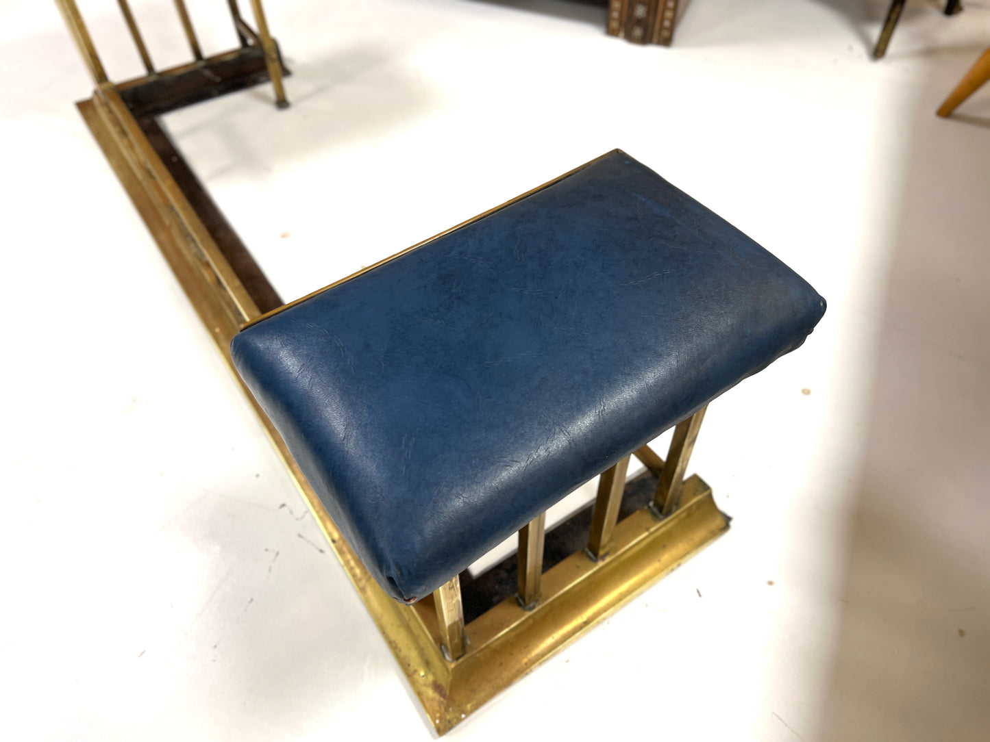 Brass Club Fender with Blue Leather Upholstered Seat