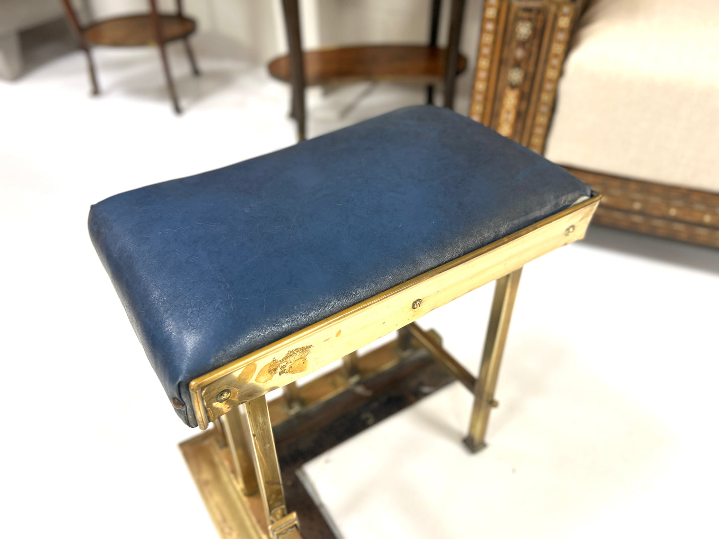 Brass Club Fender with Blue Leather Upholstered Seat