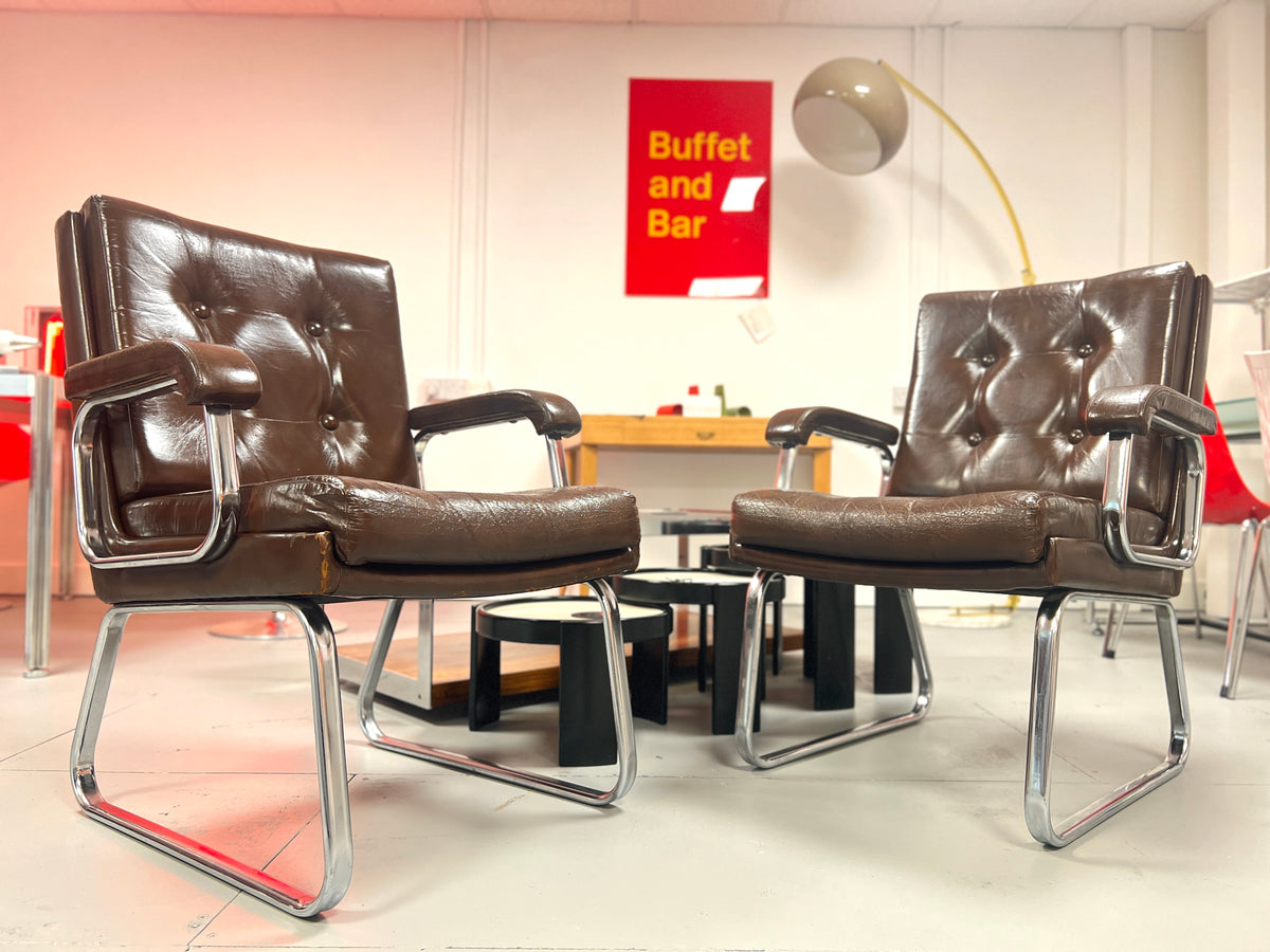 Gordon Russell for Verco brown leather armchairs