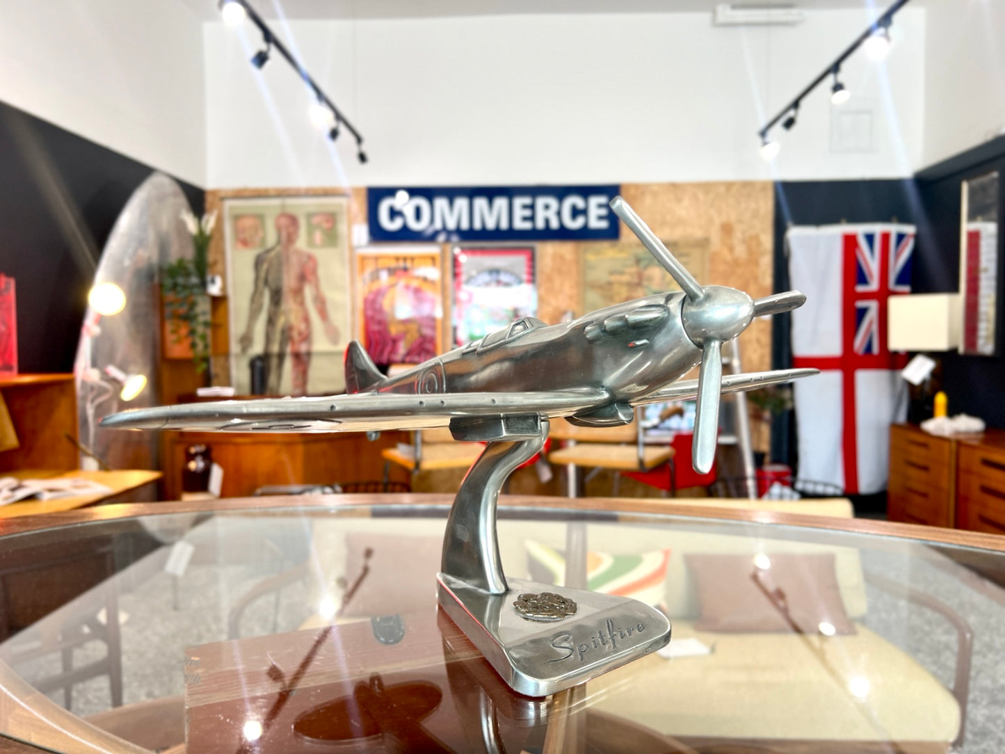 Scratch-built cast aluminium Spitfire model on stand side view