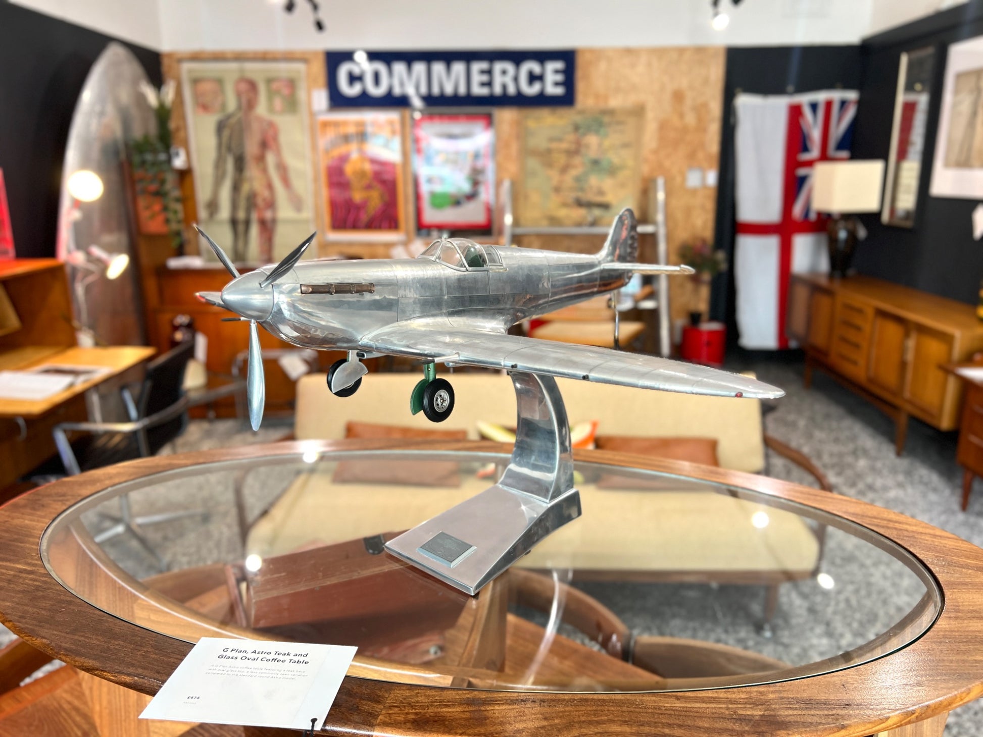 Handcrafted aluminium Spitfire aircraft model front side view