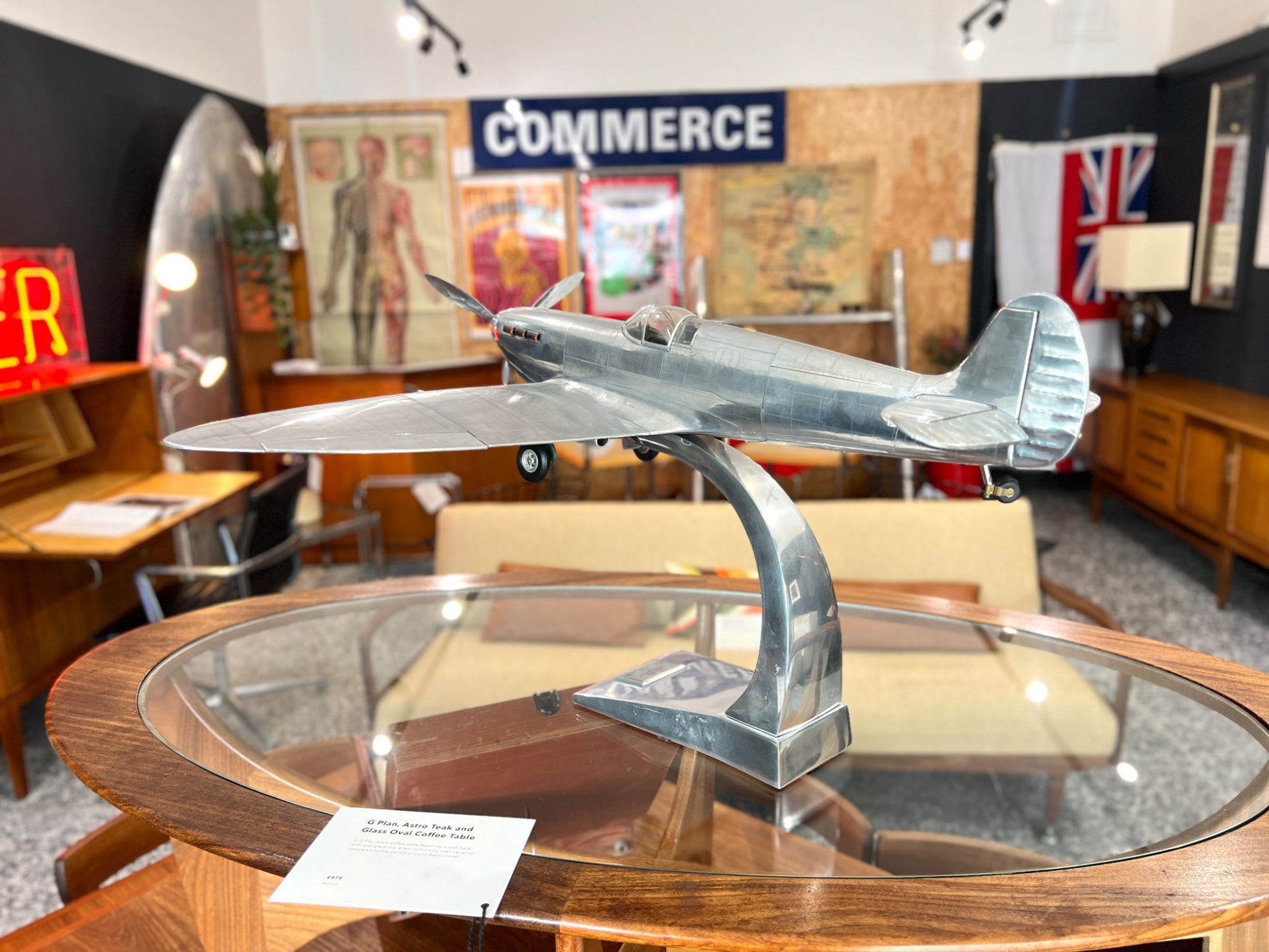 Handcrafted aluminium Spitfire aircraft model rear side view