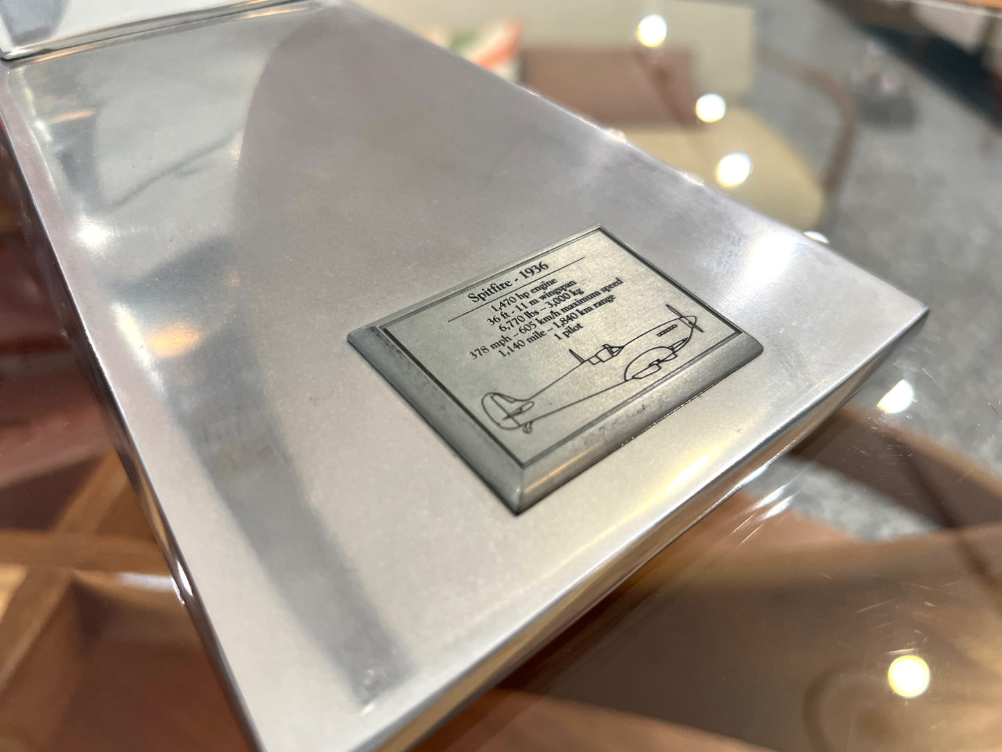 Handcrafted aluminium Spitfire aircraft model base plaque detail