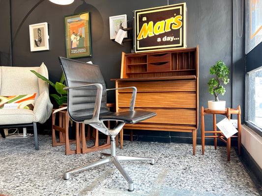 Eames EA108 swivel office chair by ICF in black leather front view