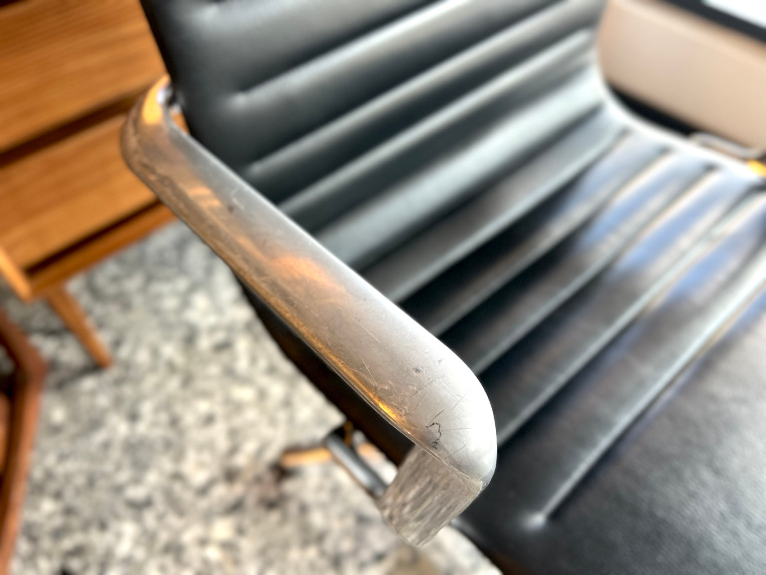 Eames EA108 office chair aluminium arm wear detail