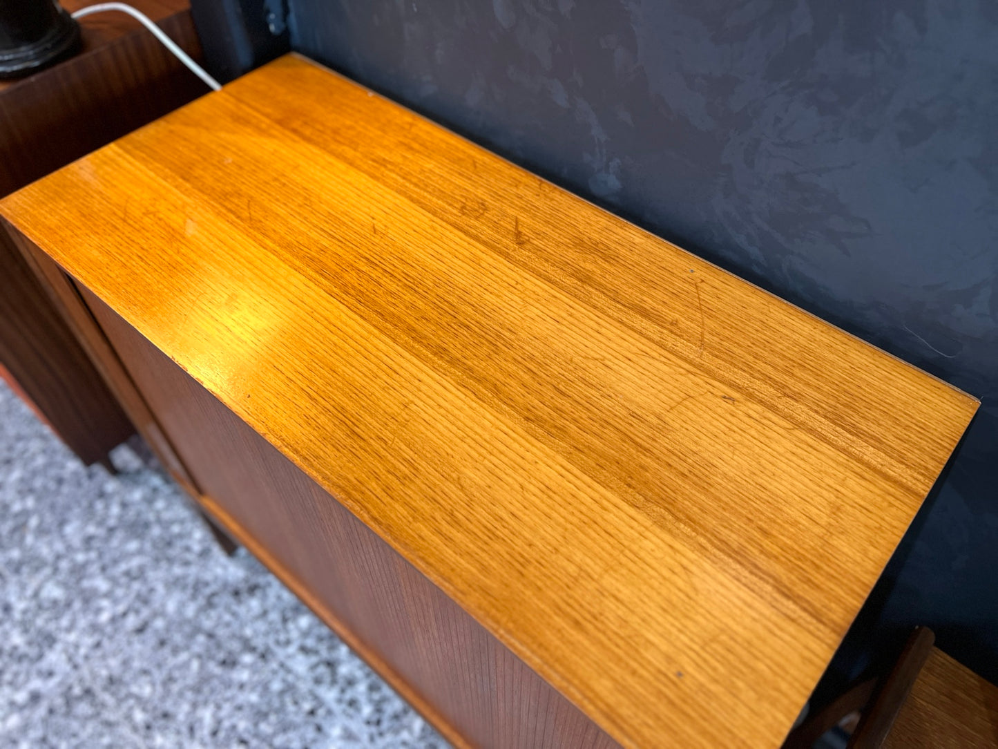 Danish teak tambour cabinet top showing vintage wear