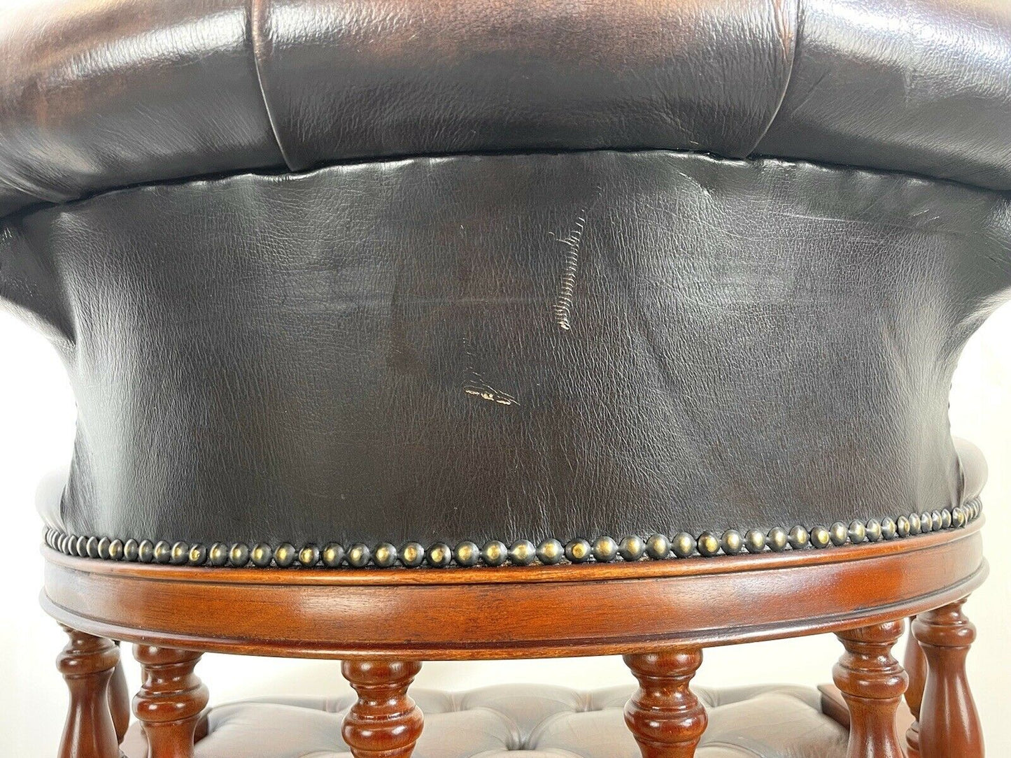 Brown Leather and Mahogany, Swivel Captains Chair