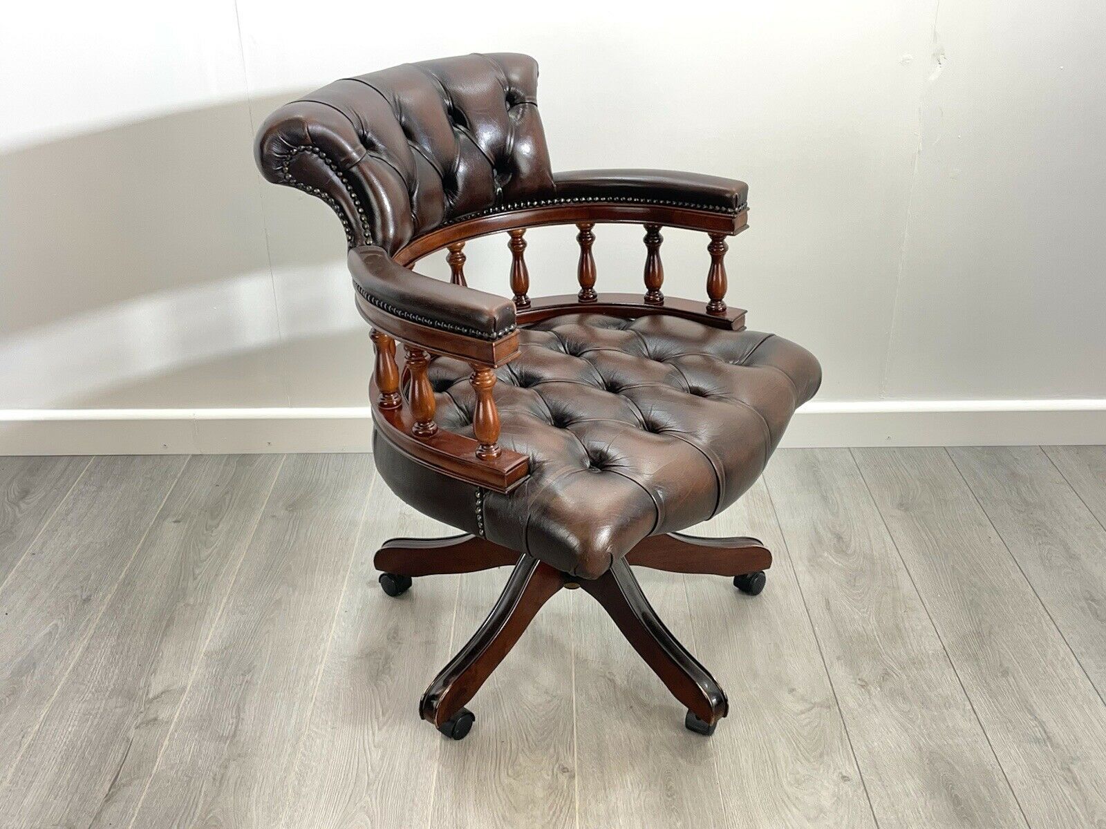 Brown Leather and Mahogany, Swivel Captains Chair