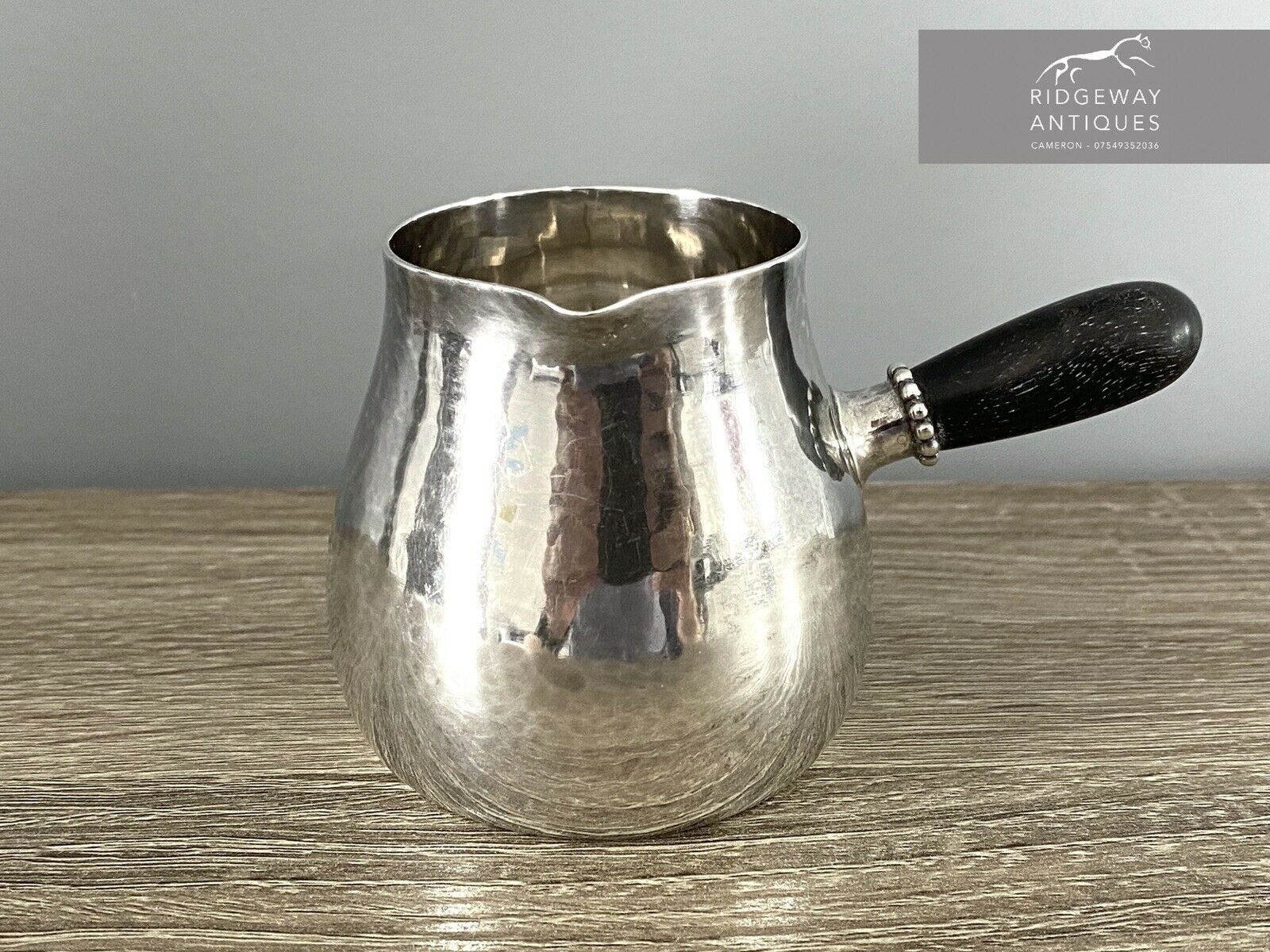 Georg Jensen Silver Hammered Cream Jug With Ebony Handle