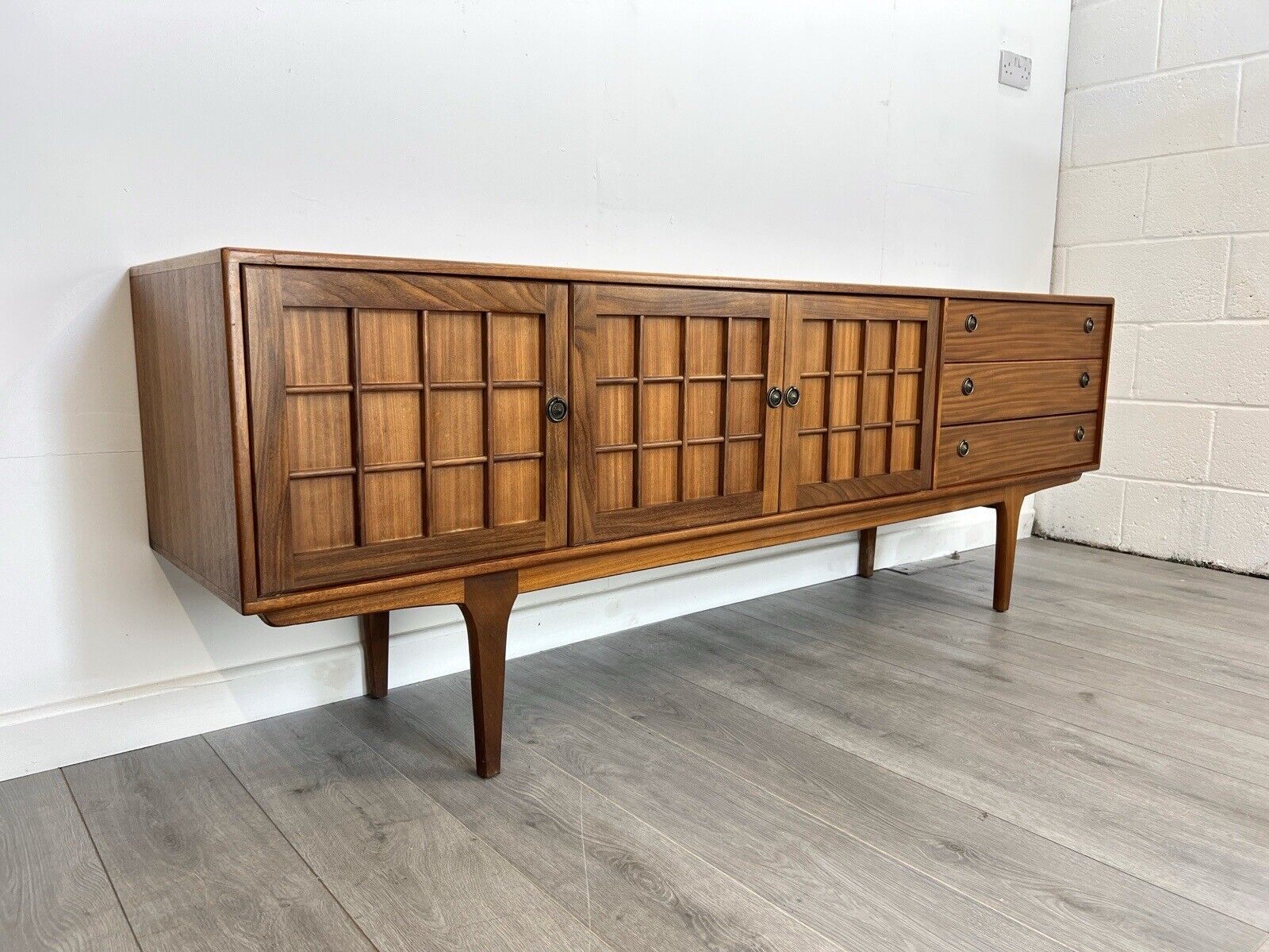 Mid century teak sideboard available for furniture hire from Hus & Home