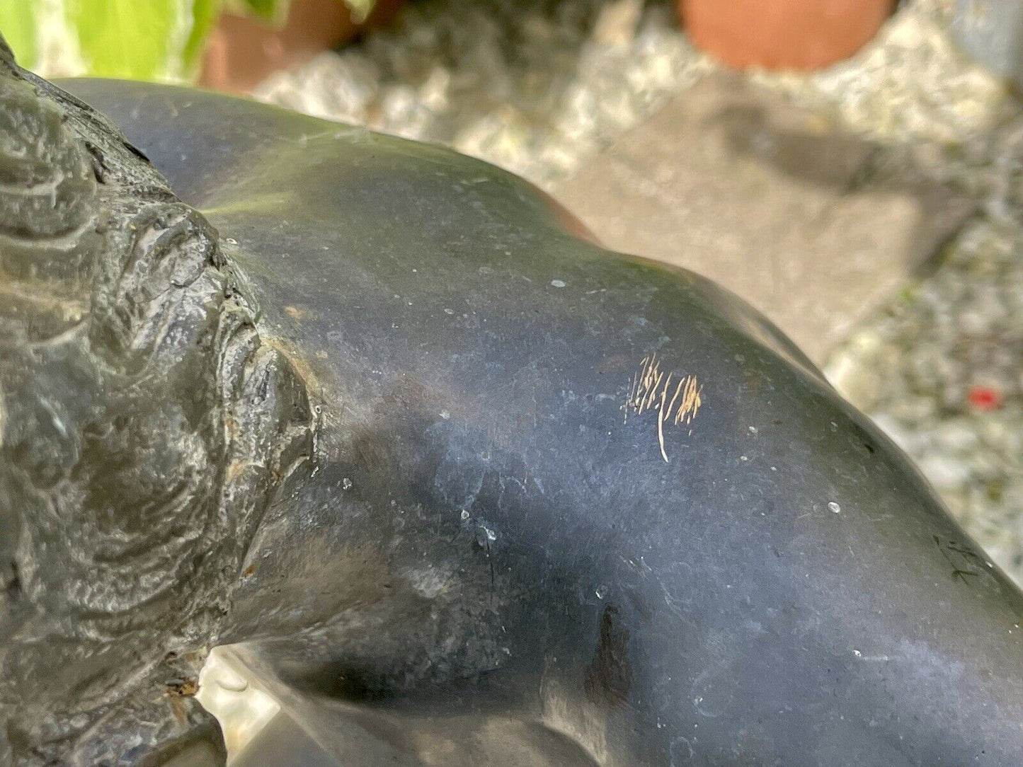 Bronzed Garden Water Feature of a Boy Stood on a Snail