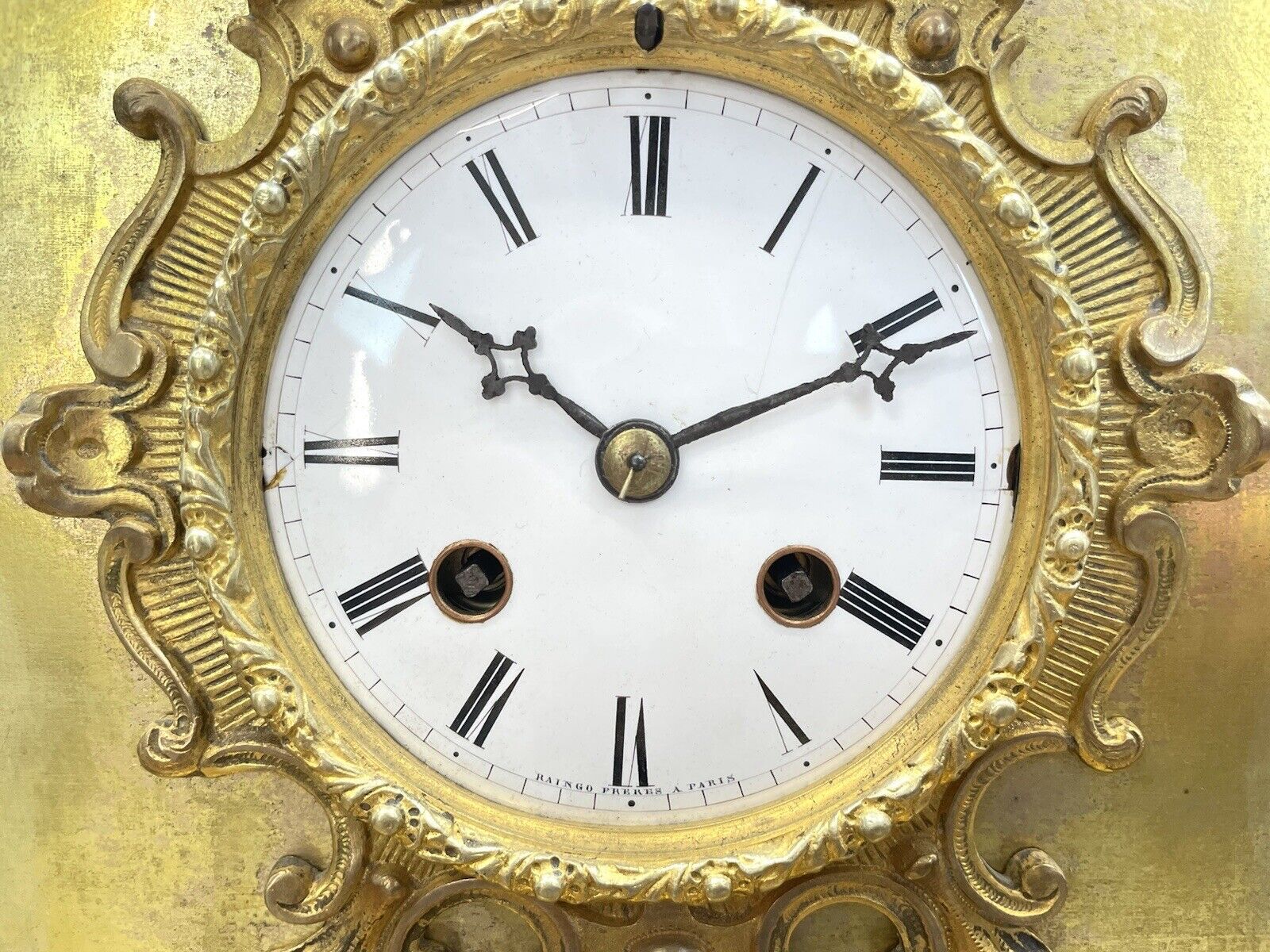 A fine, 19th Century French Empire, Gilt Mantel Clock by Raingo Freres