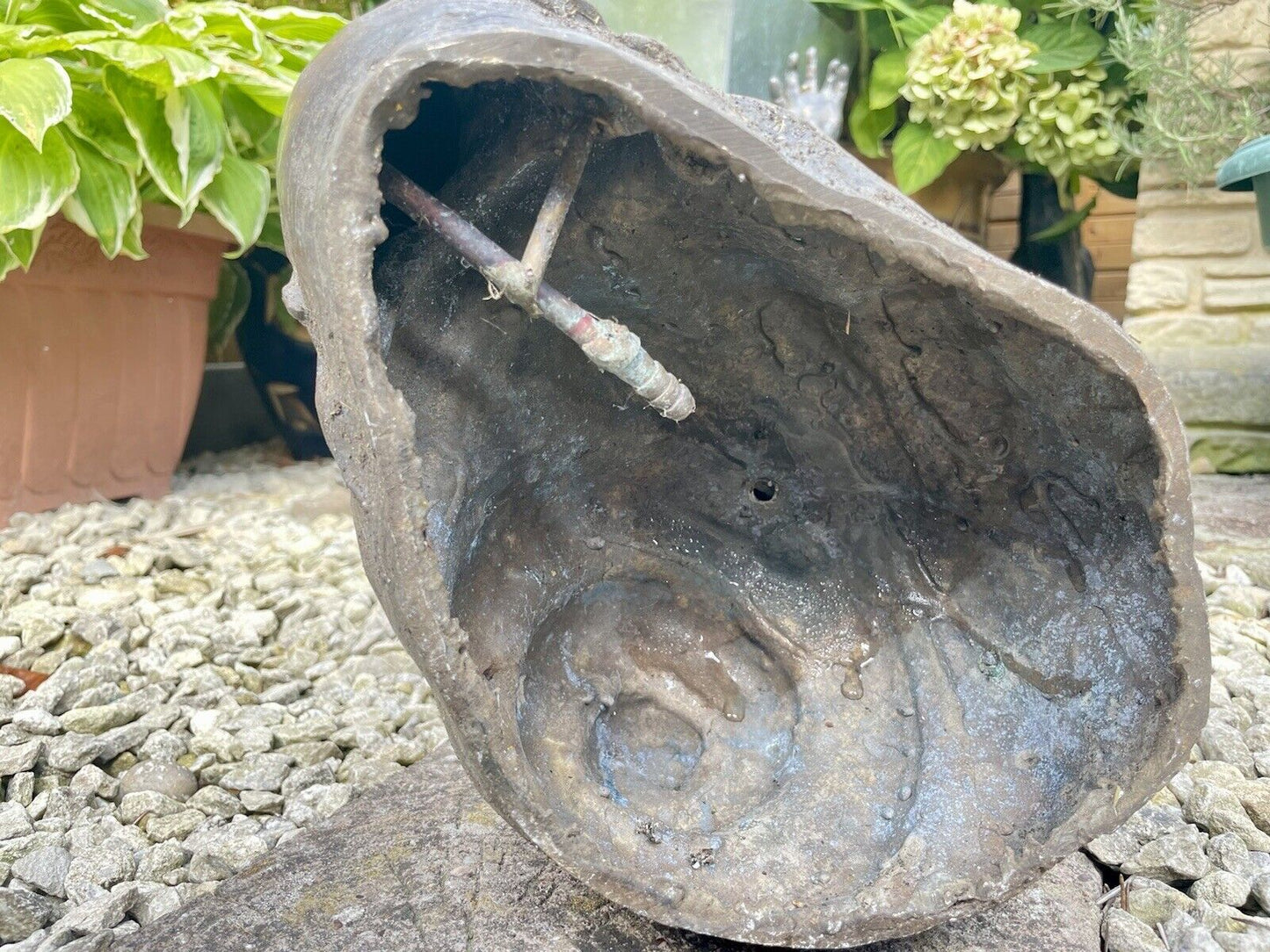 Bronzed Garden Water Feature of a Boy Stood on a Snail