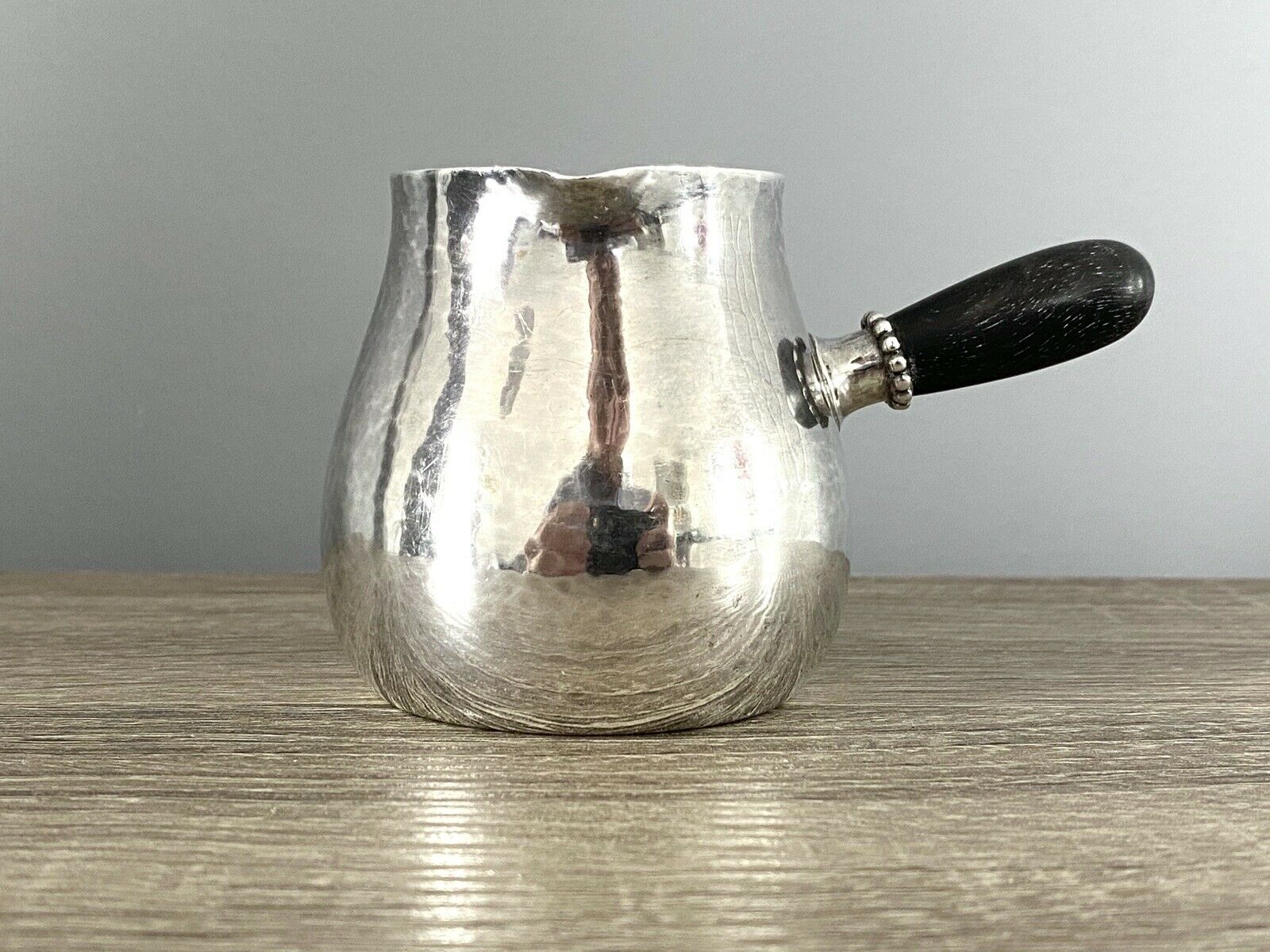 Georg Jensen Silver Hammered Cream Jug With Ebony Handle