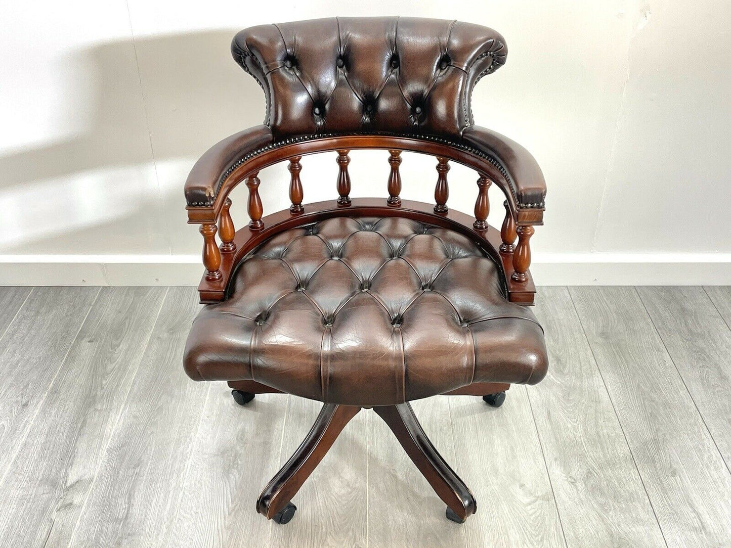 Brown Leather and Mahogany, Swivel Captains Chair