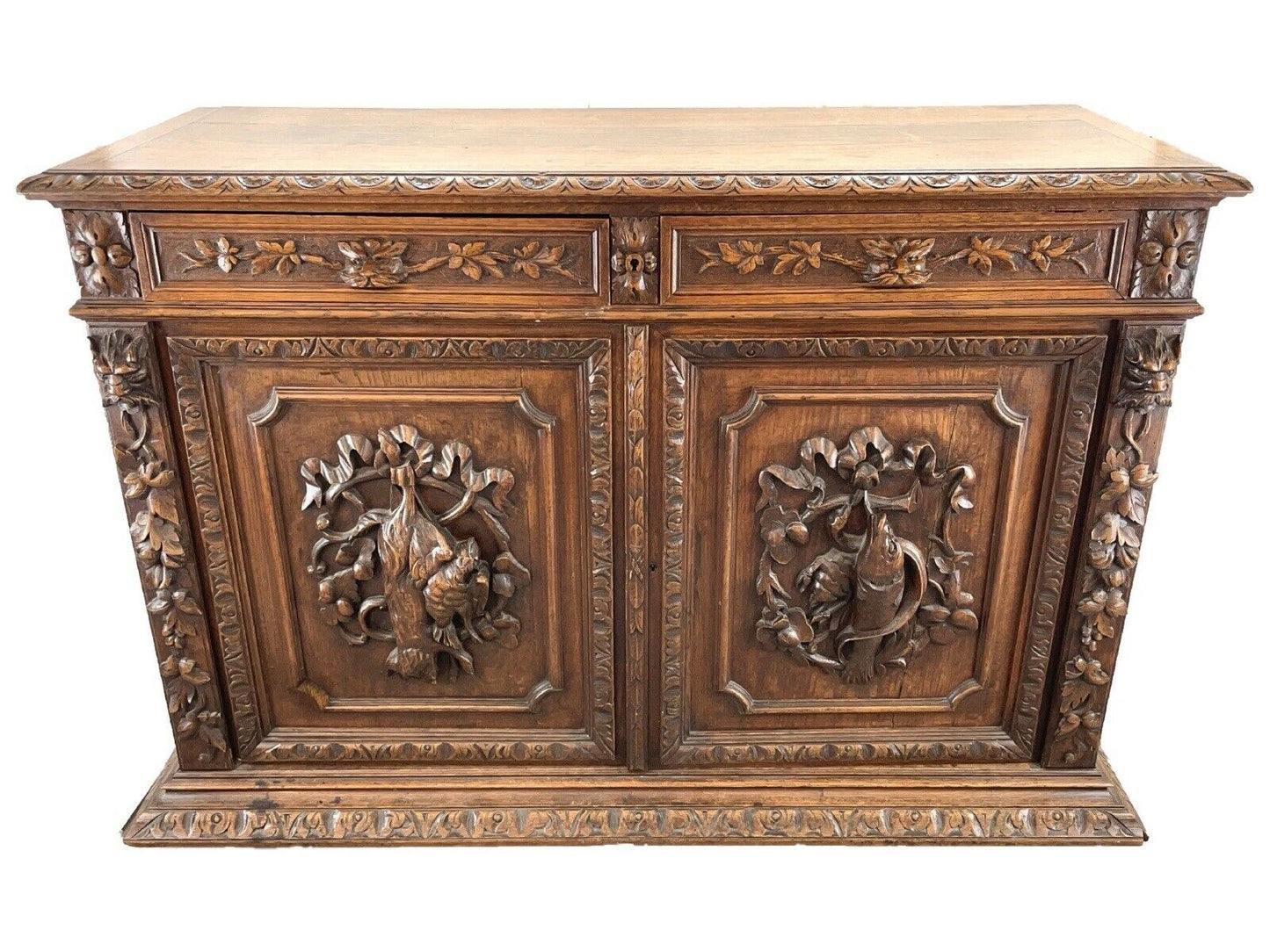 19th Century - Green Man Oak Carved Sideboard with Carvings of Game