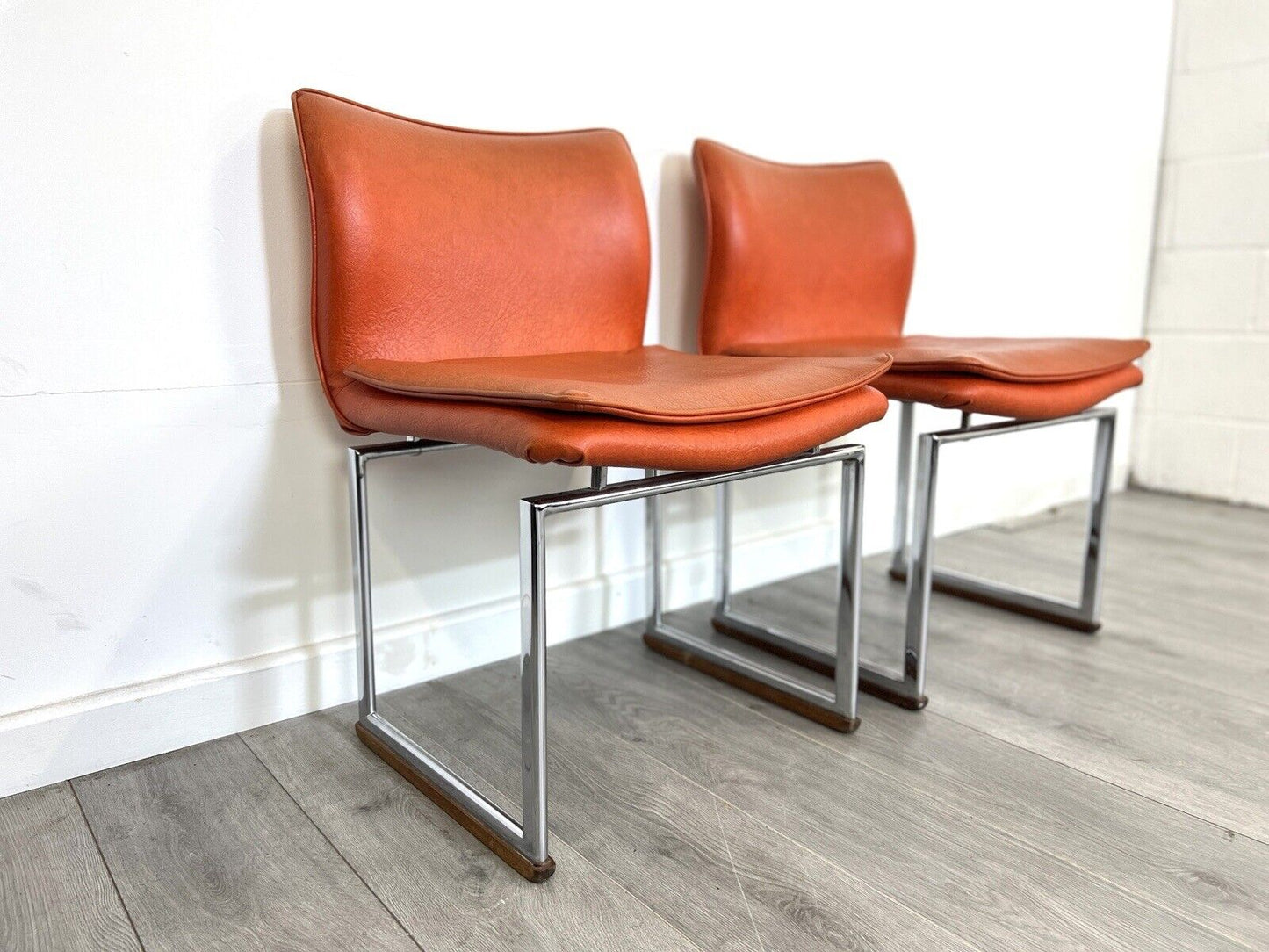 Pieff Epee, Pair of Chrome and Orange Leather Dining Chairs